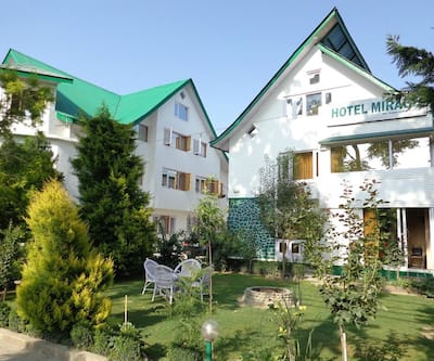 https://imgcld.yatra.com/ytimages/image/upload/t_hotel_yatra_city_desktop/v1436414126/Domestic Hotels/Hotels_Srinagar/Hotel Mirage/Overview.jpg